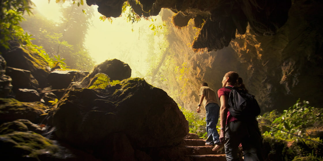 Explore caves in Belize